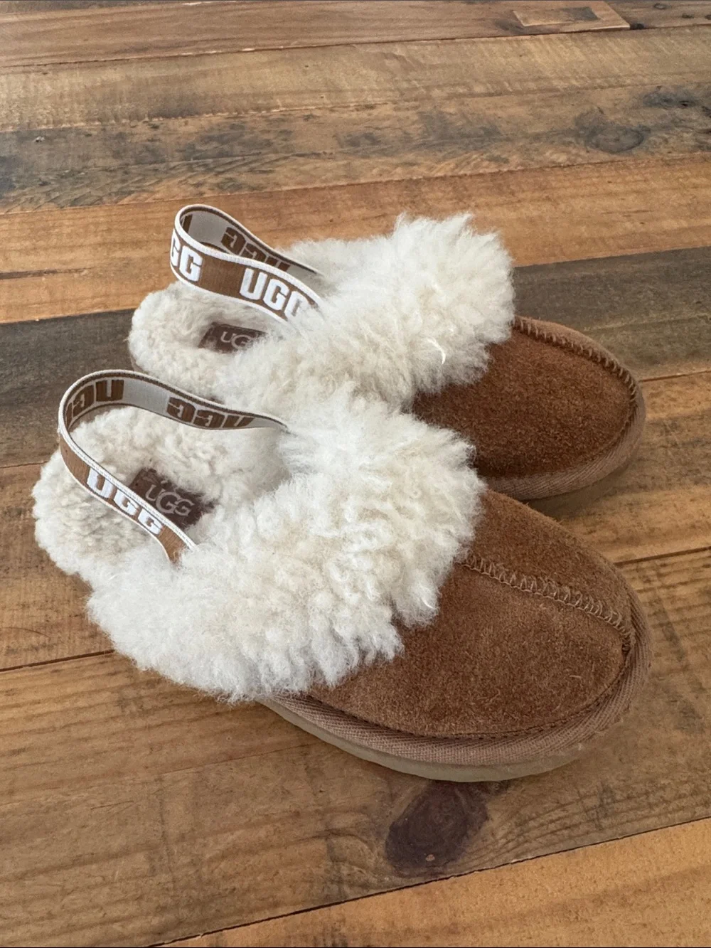UGG Kids Chestnut Brown Slip-On Suede Slippers with Cream Shearling Trim